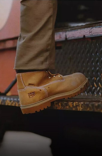 Man wearing a Timberland PRO safety boot.